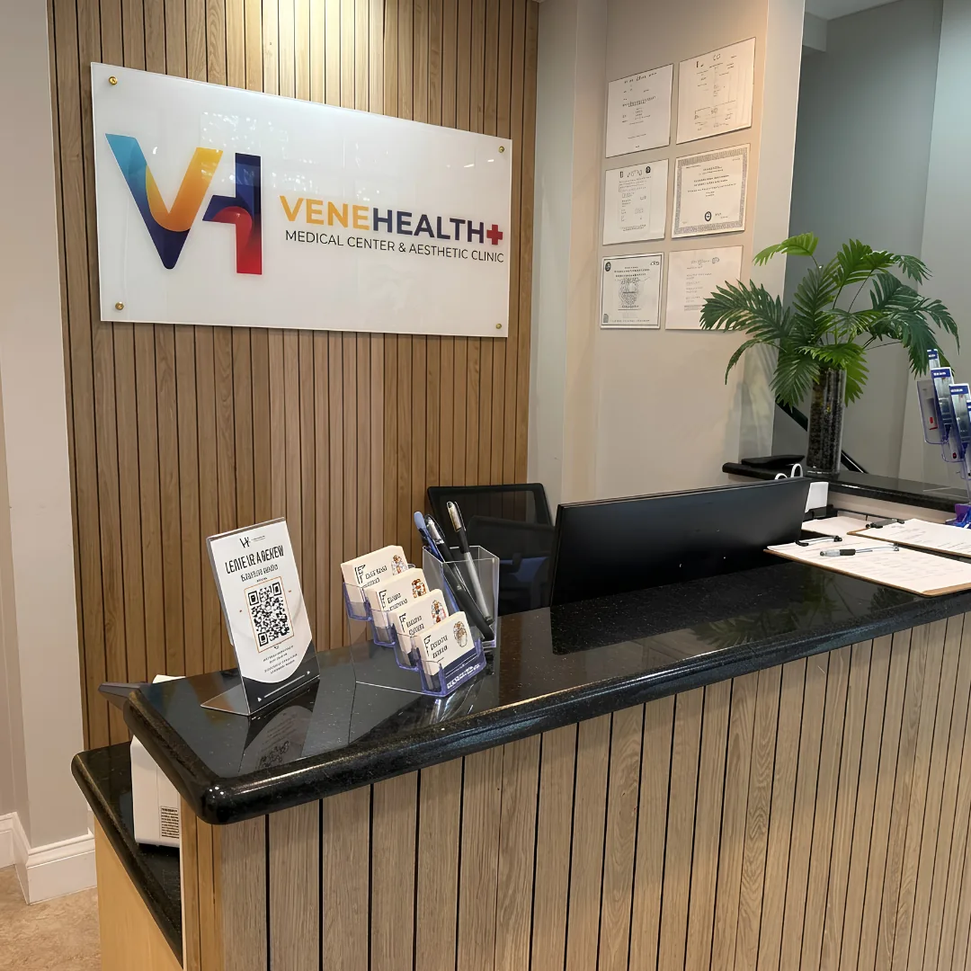 VeneHealth reception desk and logo wall in the Orlando clinic